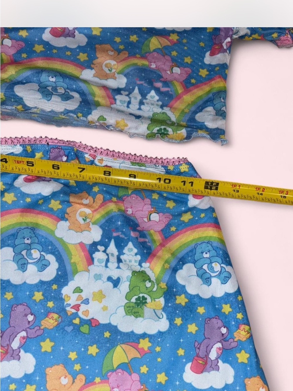Dolls Kill x Care Bears Blue Rainbow Print Crop Top with Pink Trim - Picture 4 of 7